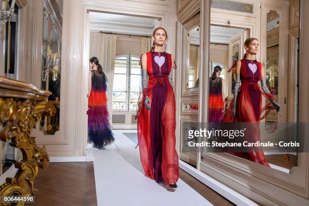Models walk the runway during the Schiaparelli Haute Couture Fall/Winter 2017-2018 show as part of Haute Couture Paris Fashion Week on July 3, 2017...