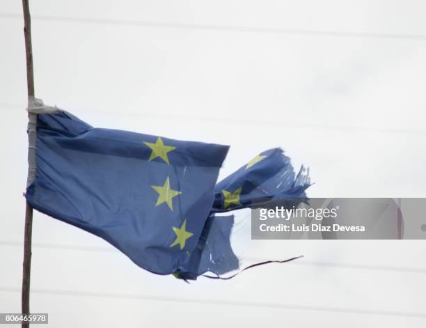 european flag divided in two - guidelines of cultural politics stock pictures, royalty-free photos & images