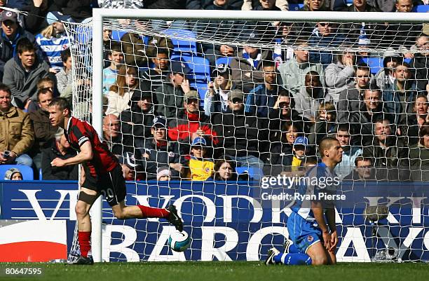 Brian McBride of Fulham celebrates after he scored his teams first goal during the Barclays Premier League match between Reading and Fulham at the...