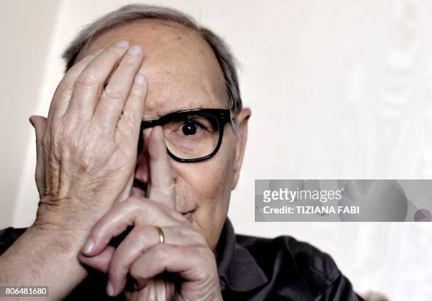 Italian composer Ennio Morricone poses during an interview in Rome on July 3, 2017.