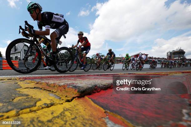 The peloton rides towards Raidillon Eau Rouge on Circuit de Spa-Francorchamps during stage three of the 2017 Le Tour de France, a 212.5km stage from...