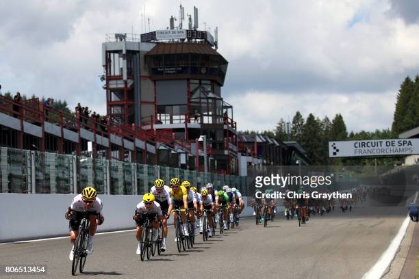 The peloton rides towards Raidillon Eau Rouge on Circuit de Spa-Francorchamps during stage three of the 2017 Le Tour de France, a 212.5km stage from...