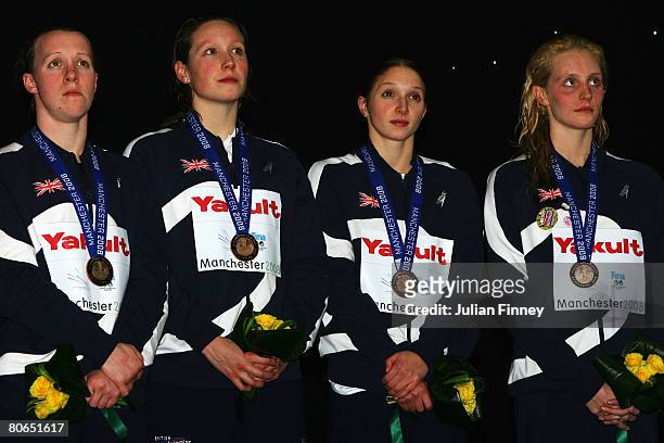 Melanie Marshall, Julia Beckett, Caitlin McClatchey and Francesca Halsallof United Kingdom receive the bronze medal in the Women's 4 x 100m Freestyle...