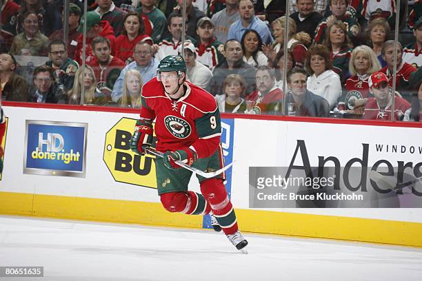 Mikko Koivu of the Minnesota Wild skates against the Colorado Avalanche during Game One of the Western Conference Quarter-Final of the Stanley Cup...