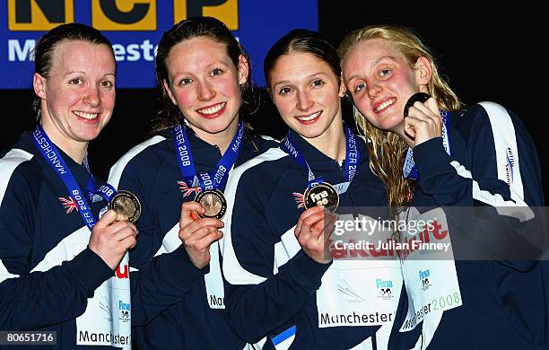 Melanie Marshall, Julia Beckett, Caitlin McClatchey and Francesca Halsallof United Kingdom receive the bronze medal in the Women's 4 x 100m Freestyle...