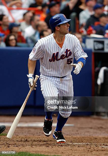 David Wright of the New York Mets watches his solo home run in the eighth inning against the Milwaukee Brewers on April 12, 2008 at Shea Stadium in...