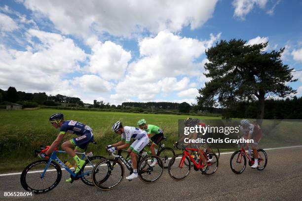 The peloton rides through the countryside during stage three of the 2017 Le Tour de France, a 212.5km stage from Verviers to Longwy on July 3, 2017...