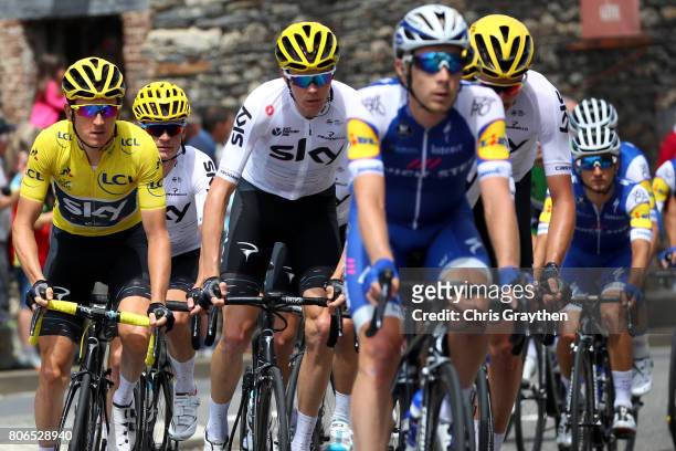 Christopher Froome of Great Britain riding for Team Sky and Geraint Thomas of Great Britain riding for Team Sky in the yellow leader's jersey rides...
