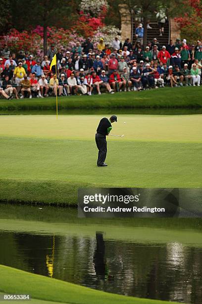 Trevor Immelman of South Africa pitches to the 15th green during the third round of the 2008 Masters Tournament at Augusta National Golf Club on...