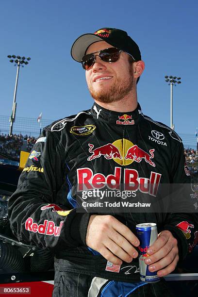 Brian Vickers, driver of the Red Bull Toyota, stands on the grid prior to the start of the NASCAR Sprint Cup Series Subway Fresh Fit 500 at Phoenix...