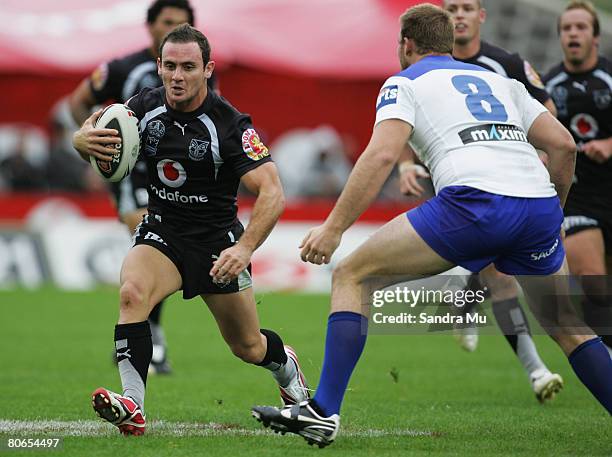 Lance Hohaia of the Warriors looks to run past Jarrad Hickey of the Bulldogs during the round five NRL match between the Warriors and the Bulldogs at...