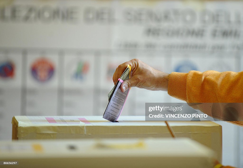 Italy's voter casts their ballots at a p