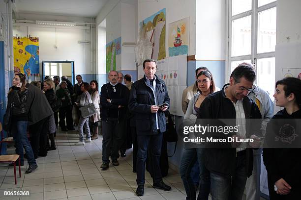 Right candidate Alleanza Nazionale party leader Gianfranco Fini arrives to the pooling station to cast his vote in Italian Parliamentary Election on...