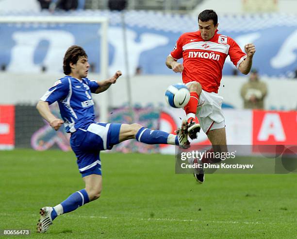 Tsvetan Genkov of FC Dynamo Moscow competes for the ball with Martin Stranzl of FC Spartak Moscow during the Russian Football League Championship...