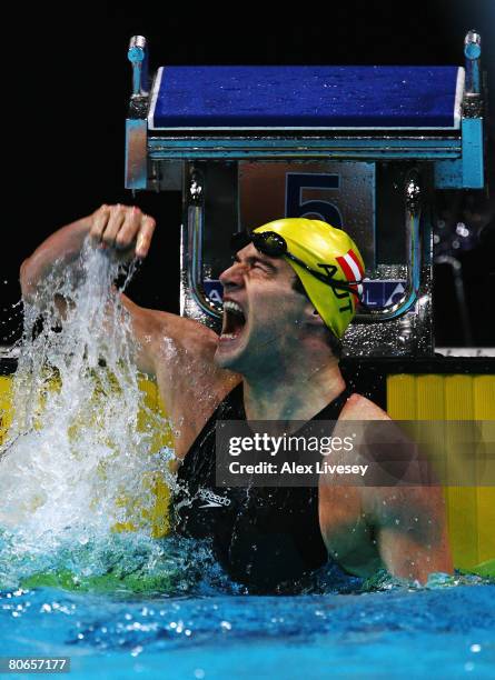 Markus Rogan of Austria celebrates winning the gold medal in the Men's 200m Backstroke Final during the ninth FINA World Swimming Championships at...