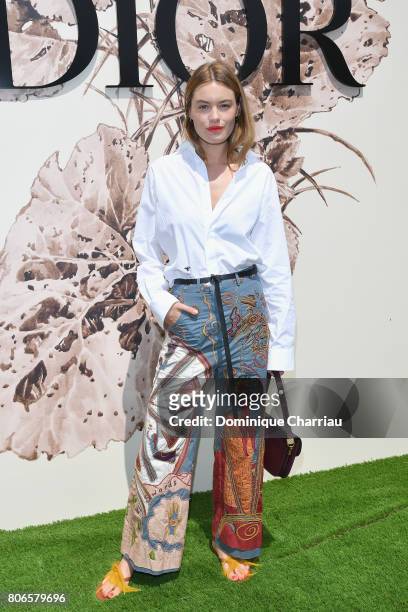 Camille Rowe attends the Christian Dior Haute Couture Fall/Winter 2017-2018 show as part of Haute Couture Paris Fashion Week on July 3, 2017 in...