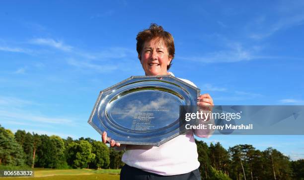 Alison Nicholas of Beau Desert Golf Club poses with the trophy after winning, on the fourth play off hole, the Titleist and FootJoy Women's PGA...