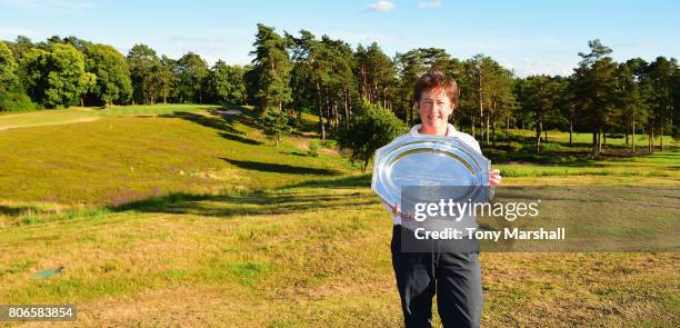 Alison Nicholas of Beau Desert Golf Club poses with the trophy after winning, on the fourth play off hole, the Titleist and FootJoy Women's PGA...