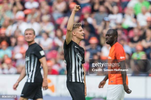 Mick Schumacher of Schumacher and Friends celebrates his team's second goal during the Champions for Charity Friendly match at Opel Arena on July 3,...