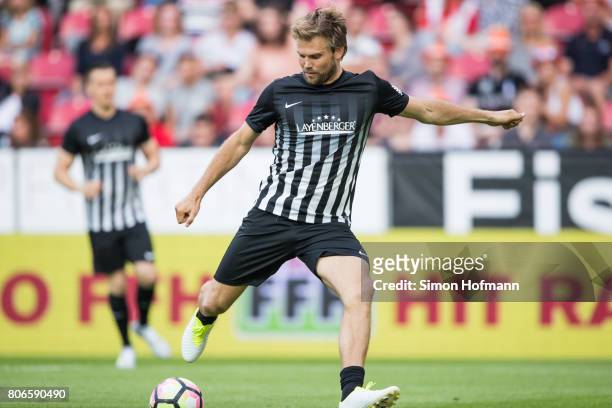 Moritz Fuerste of Schumacher and Friends controls the ball during the Champions for Charity Friendly match at Opel Arena on July 3, 2017 in Mainz,...