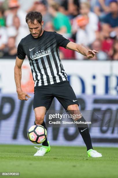 Sven Hannawald of Schumacher and Friends controls the ball during the Champions for Charity Friendly match at Opel Arena on July 3, 2017 in Mainz,...