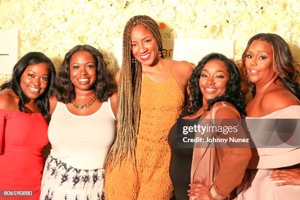 Miatta Johnson, Marilyn Van Alstyne, Roe Williams, Massah David, and Kristi Henderson attend the Strength Of A Woman Brunch hosted by Mary J. Blige...