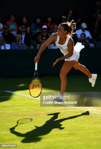 Ana Bogdan of Romania serves during the Ladies Singles first round match against Ying-Ying Duan of China day one of the Wimbledon Lawn Tennis...