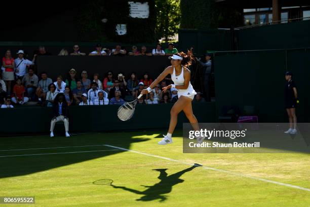 Ying-Ying Duan of China serves during the Ladies Singles first round match against Ana Bogdan of Romania on day one of the Wimbledon Lawn Tennis...