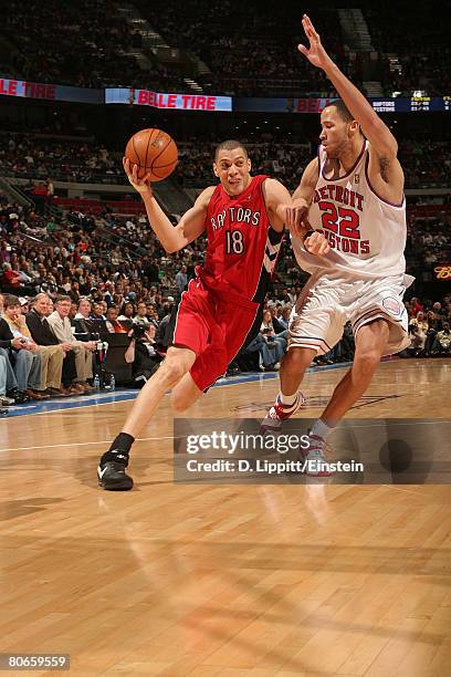 Anthony Parker of the Toronto Raptors drives around Tayshaun Prince of the Detroit Pistons on April 13, 2008 at the Palace of Auburn Hills in Auburn...