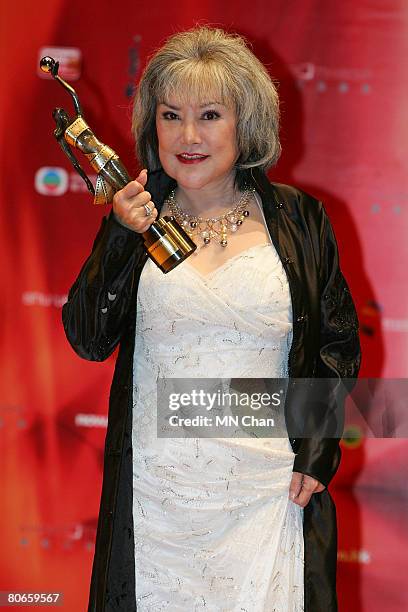 Susan Shaw wins the Best Supporting Actress award for the movie 'The Pye-Dog' at the 27th Hong Kong Film Awards at the Hong Kong Cultural Centre on...
