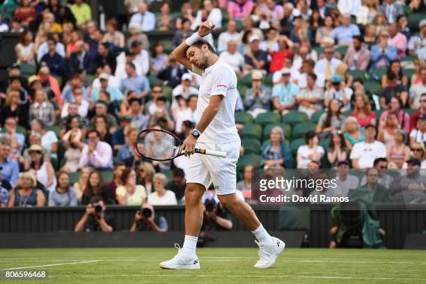 Stan Wawrinka of Switzerland looks dejected during the Gentlemen's Singles first round match against Daniil Medvedev of Russia on day one of the...