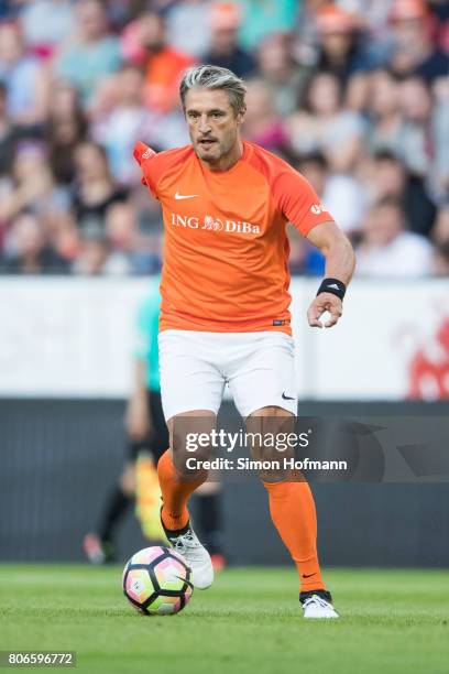 Gerd Schoenfelder of Nowitzki All Stars controls the ball during the Champions for Charity Friendly match at Opel Arena on July 3, 2017 in Mainz,...