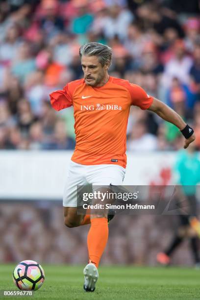 Gerd Schoenfelder of Nowitzki All Stars controls the ball during the Champions for Charity Friendly match at Opel Arena on July 3, 2017 in Mainz,...