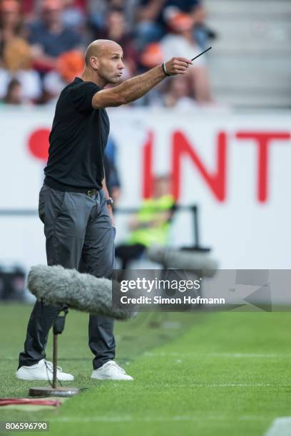 Head coach Andre Schubert of Schumacher and Friends gestures during the Champions for Charity Friendly match at Opel Arena on July 3, 2017 in Mainz,...