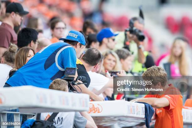 Dirk Nowitzki of Nowitzki All Stars signs autographs during the Champions for Charity Friendly match at Opel Arena on July 3, 2017 in Mainz, Germany.