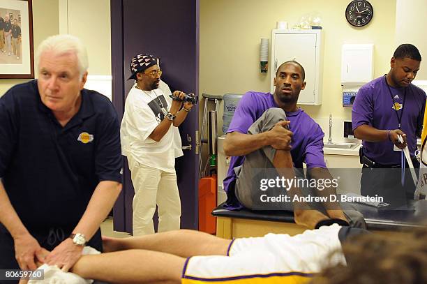 Filmmaker Spike Lee films Kobe Bryant of the Los Angeles Lakers prior to the game against the San Antonio Spurs at Staples Center on April 13, 2008...