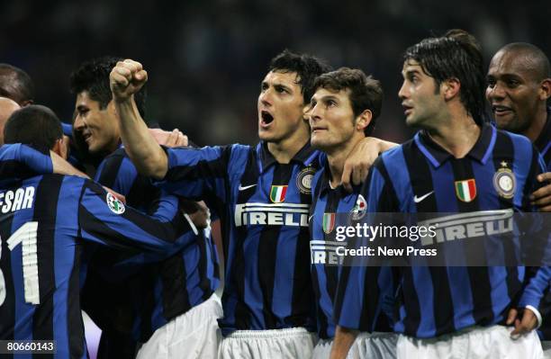 Nicolas Andrea Burdisso and Javier Zanetti and Cristian Chivu of Inter at the end of match i during the Serie A match between Inter and Fiorentina at...