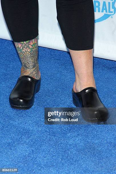 Detail of Rosie O'Donnell's tatoo is seen as she arrives for the "Night of Too Many Stars: An Overbooked Benefit for Autism Education" presented by...