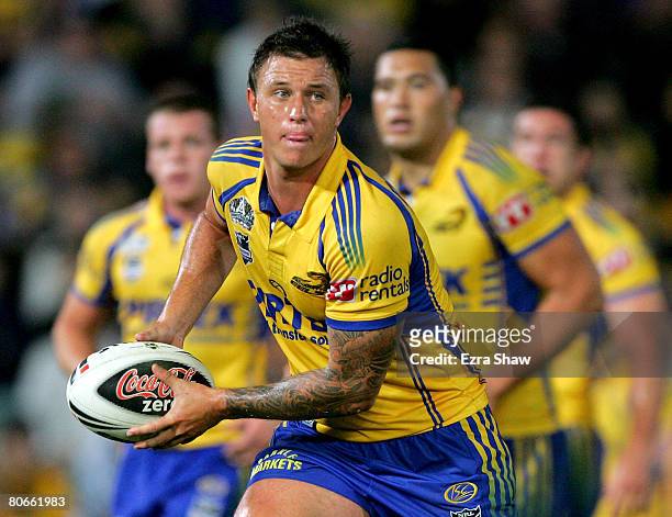 Tim Smith of the Eels offloads the ball during the round five NRL match between the Parramatta Eels and the Gold Coast Titans at Parramatta Stadium...