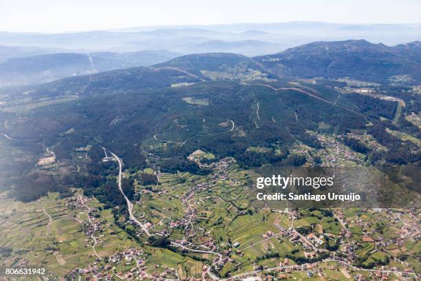 aerial view of villages around vigo - urban sprawl forest stock pictures, royalty-free photos & images