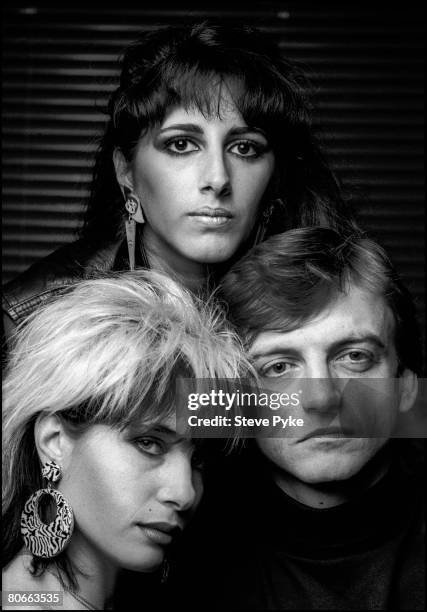 English vocalist and songwriter Mark E. Smith with his wife, American guitarist Brix Smith , and American keyboard player Marcia Schofield of British...