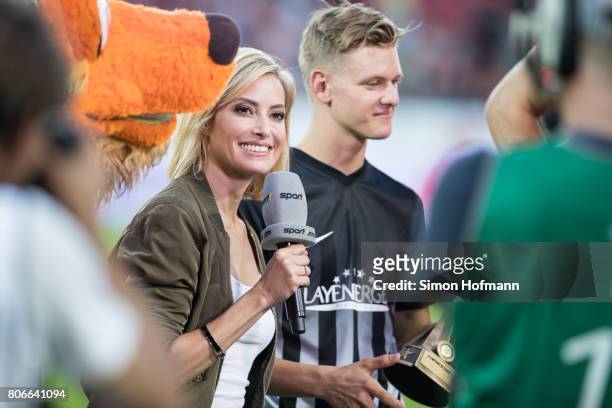 Sarah Winkhaus and Mick Schumacher attend the Champions for Charity Friendly match at Opel Arena on July 3, 2017 in Mainz, Germany.