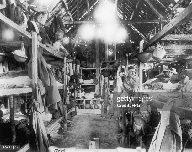 The barracks where troops of the US 305th MP Train, Co. A, are billeted in Beauval, France, during World War I, July 1918.