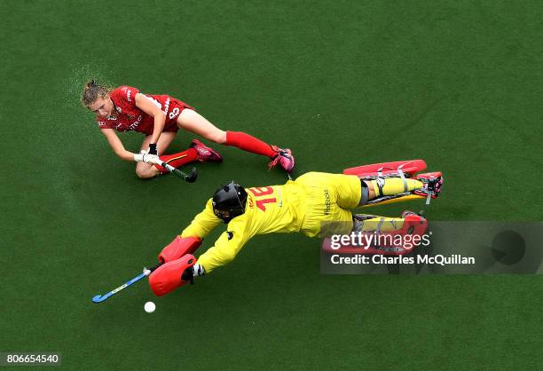 Stephanie Vanden Borre of Belgium scores past Maria Ruiz of Spain in a penalty shoot out during the Fintro Hockey World League Semi-Final 7/8th...