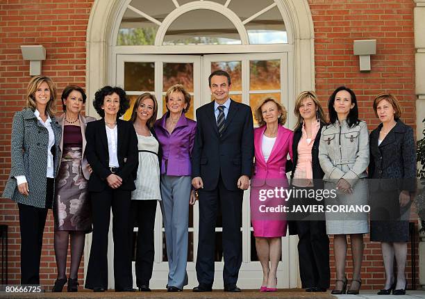 Spanish Prime Minister Jose Luis Rodriguez Zapatero poses on the steps of the Moncloa palace in Madrid with his female cabinet ministers Science and...