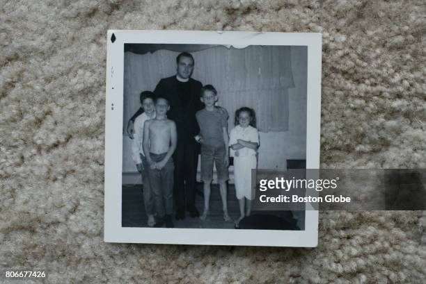 Photo from 1968, pictured in Springfield, MA on Oct. 24 shows Father Richard Lavigne with Joe Croteau Danny Croteau Michael Croteau and their sister...