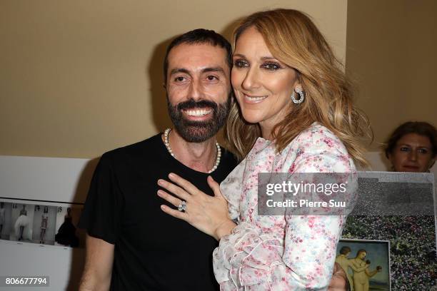 Celine Dion poses with Giambattista Valli at the Giambattista Valli Haute Couture Fall/Winter 2017-2018 show as part of Haute Couture Paris Fashion...