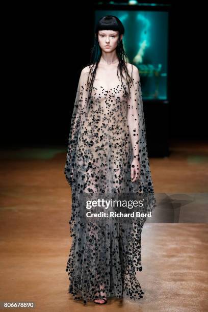 Model walks the runway during the Iris Van Herpen Haute Couture Fall/Winter 2017-2018 show as part of Haute Couture Paris Fashion Week on July 3,...