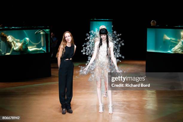 Designer Iris Van Herpen acknowledges the audience during the Iris Van Herpen Haute Couture Fall/Winter 2017-2018 show as part of Haute Couture Paris...