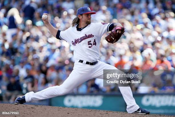 Michael Blazek of the Milwaukee Brewers pitches in the eighth inning against the Baltimore Orioles at Miller Park on July 3, 2017 in Milwaukee,...